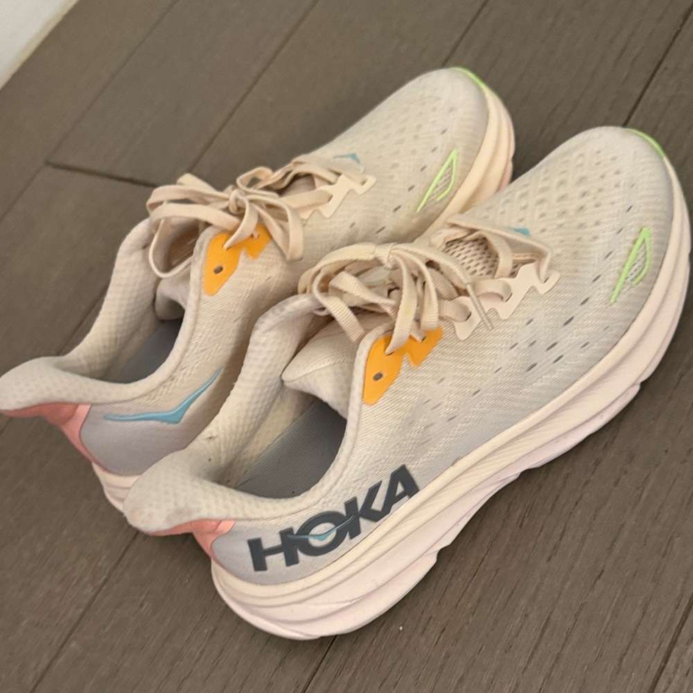 Hoka Cream and Orange Athletic Shoes